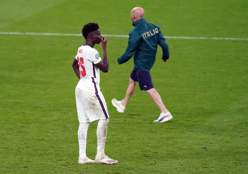 Bukayo Saka stands dejected after missing from the penalty spot during the shoot out following the UEFA Euro 2020 Final at Wembley Stadium, London....