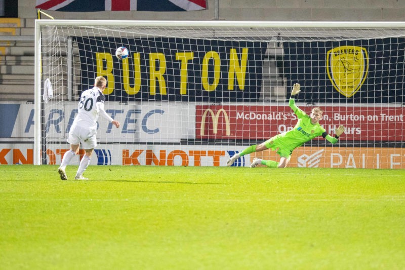 Fulham forward Mika Biereth 80 blasts over the bar during the EFL Trophy match between Burton Albion and U21 Fulham at the Pirelli Stadium, Burton ...