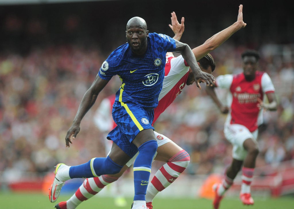 Football - 2021 / 2022 Premier League - Arsenal vs Chelsea - Emirates Stadium - Sunday 22nd August 2021 Romelu Lukaku of Chelsea making his debut , holds off Pablo Mari to score the opening goal