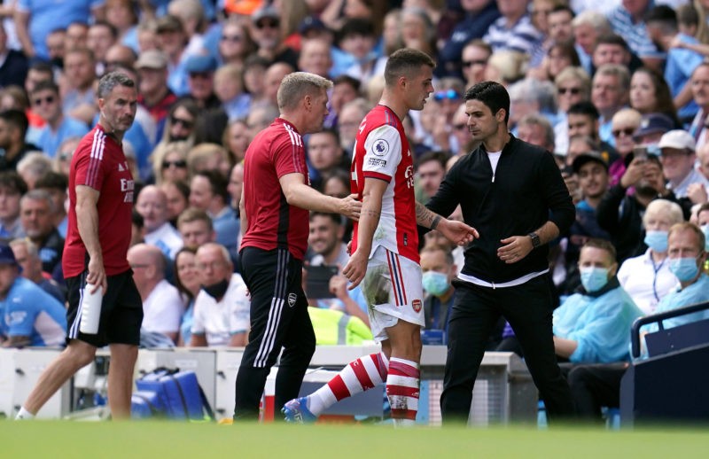 Manchester City v Arsenal - Premier League - Etihad Stadium Arsenals Granit Xhaka walks past manager Mikel Arteta after being sent off during the P...