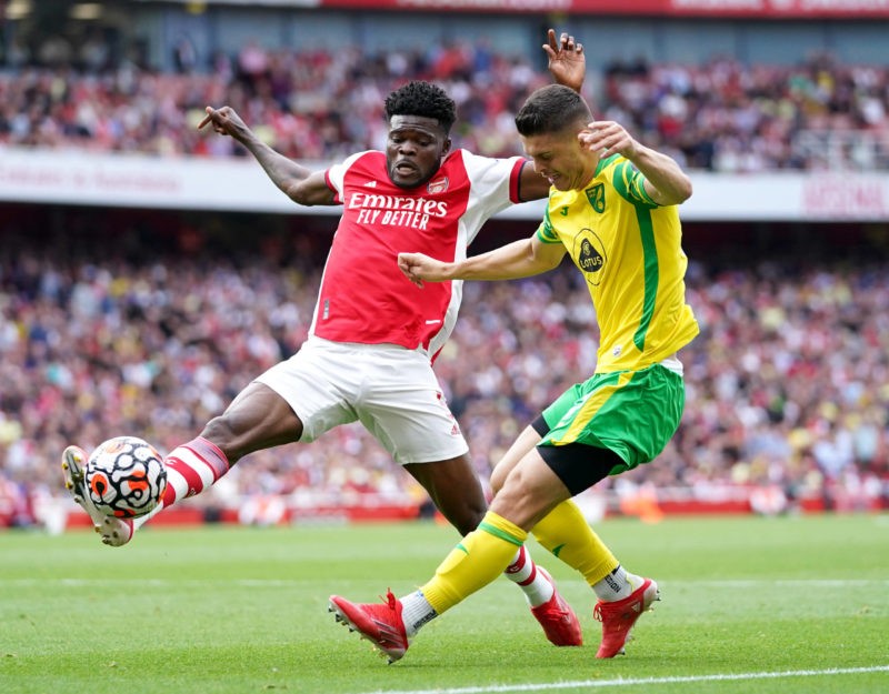 Arsenal v Norwich City Premier League Thomas Partey of Arsenal blocks a cross from Milot Rashica of Norwich during the Premier League match at the ...
