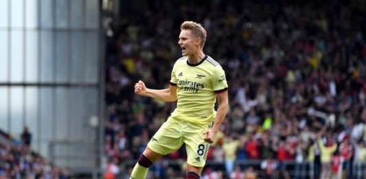 Burnley v Arsenal - Premier League - Turf Moor Arsenal s Martin Odegaard celebrates scoring their side s first goal of the game during the Premier League match at Turf Moor, Burnley. Picture date: Saturday September 18, 2021. Copyright: Anthony Devlin
