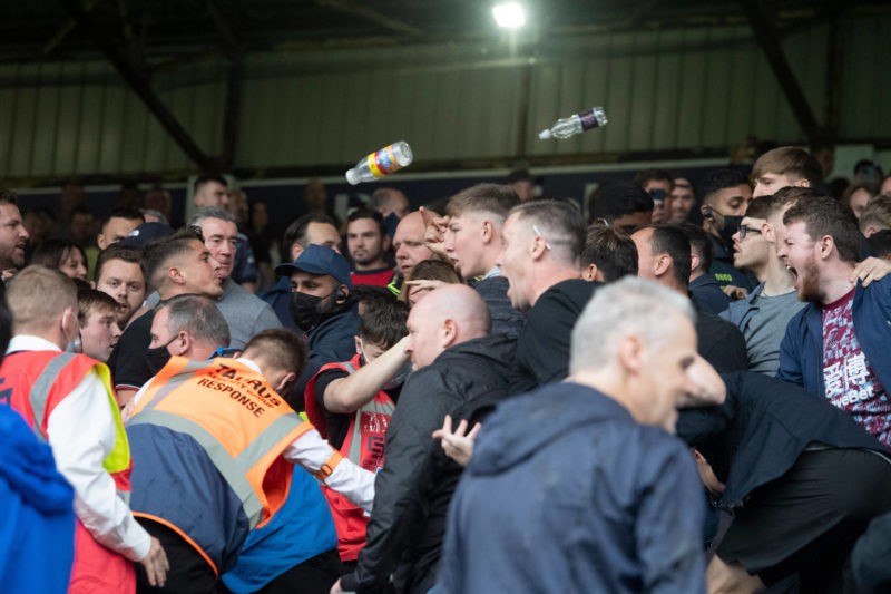 Police seeking fans from Burnley vs Arsenal match 4 Trouble breaks out at full time between Arsenal left and Burnley right supporters following the Premier League match at Turf Moor, Burnley Copyright: Russell Hart