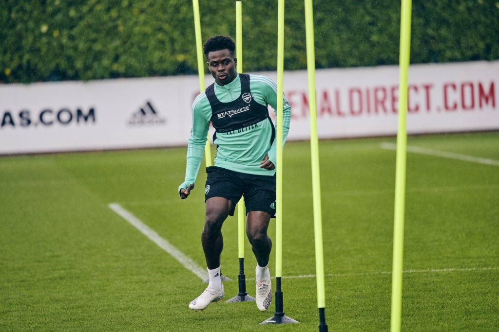 Bukayo Saka wearing a STATSports vest in training
