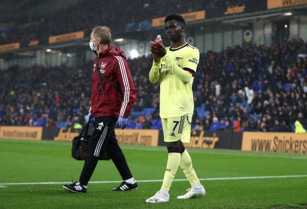 BRIGHTON, ENGLAND: Bukayo Saka of Arsenal applauds fans after being substituted after an injury during the Premier League match between Brighton & ...
