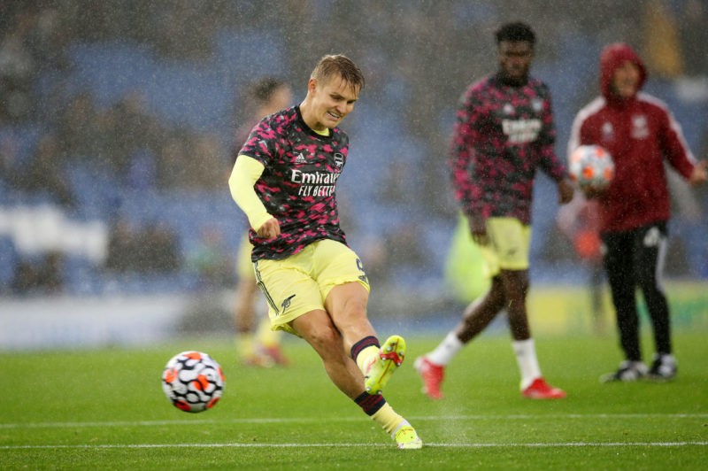 BRIGHTON, ENGLAND - OCTOBER 02: Martin Odegaard of Arsenal shoots during the warm up prior to the Premier League match between Brighton & Hove ...