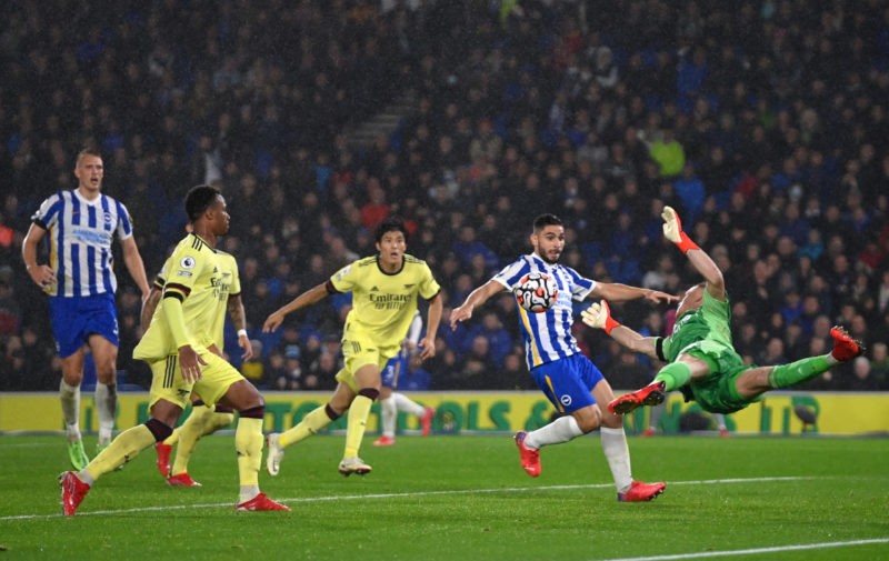BRIGHTON, ENGLAND - OCTOBER 02: Aaron Ramsdale of Arsenal makes a save from Neal Maupay of Brighton & Hove Albion during the Premier League match between Brighton & Hove Albion and Arsenal at American Express Community Stadium on October 02, 2021 in Brighton, England. (Photo by Mike Hewitt/Getty Images)