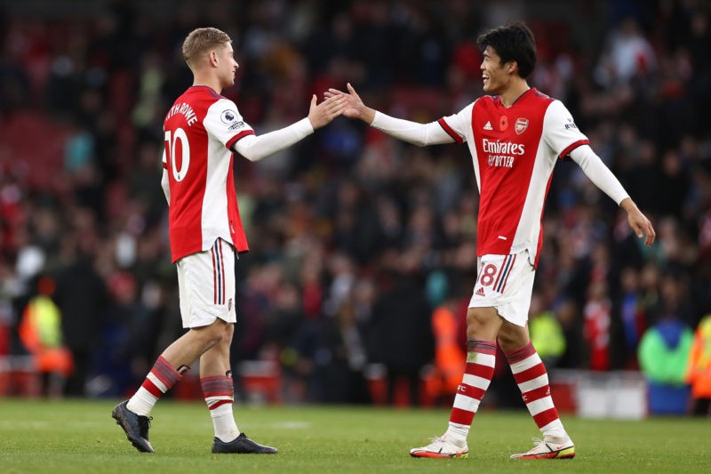 LONDON, ENGLAND - NOVEMBER 07: Emile Smith Rowe and Takehiro Tomiyasu of Arsenal shake hands after the Premier League match between Arsenal and Wat...
