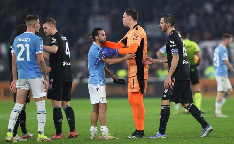Wojciech Szczesny celebrates Juventus milestone 2 ROME, ITALY - NOVEMBER 20: Pedro of SS Lazio embraces Leonardo Bonucci and Wojciech Szczesny of Juventus during the Serie A match between SS Lazio and Juventus at Stadio Olimpico on November 20, 2021 in Rome, Italy. (Photo by Paolo Bruno/Getty Images)
