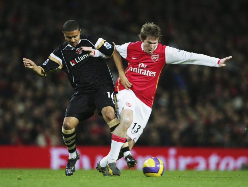 LONDON - JANUARY 02: Alexander Hleb of Arsenal is tackled by Jerome Thomas of Charlton Athletic during the Barclays Premiership match between Arsenal and Charlton Athletic at the Emirates Stadium on January 2, 2007 in London, England. (Photo by Phil Cole/Getty Images)