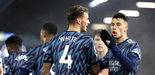 LEEDS, ENGLAND - DECEMBER 18: Gabriel Martinelli of Arsenal celebrates after scoring their team's second goal during the Premier League match between Leeds United and Arsenal at Elland Road on December 18, 2021 in Leeds, England. (Photo by Naomi Baker/Getty Images)
