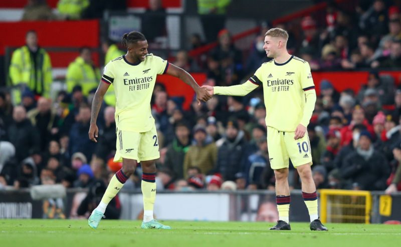 MANCHESTER, ENGLAND - DECEMBER 02: Emile Smith Rowe of Arsenal celebrates with Nuno Tavares after scoring their side's first goal during the Premie...