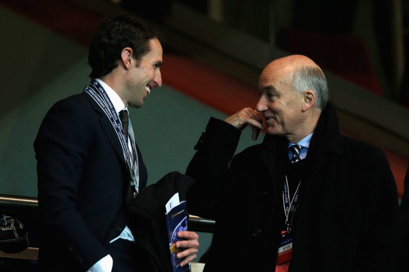 PARIS, FRANCE - MARCH 06: Gareth Southgate (L) and David Elleray speak prior to the Round of 16 UEFA Champions League match between Paris St Germai...