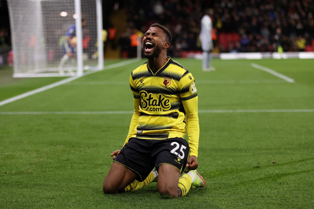 WATFORD, ENGLAND: Emmanuel Dennis of Watford FC celebrates after scoring their side's first goal during the Premier League match between Watford and Chelsea at Vicarage Road on December 01, 2021. (Photo by Richard Heathcote/Getty Images)