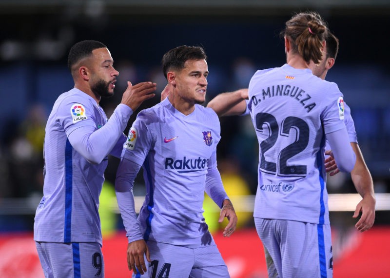 VILLARREAL, SPAIN - NOVEMBER 27: Philippe Coutinho of FC Barcelona celebrates with teammate Memphis Depay after scoring their side's third goal during the La Liga Santander match between Villarreal CF and FC Barcelona at Estadio de la Ceramica on November 27, 2021 in Villarreal, Spain. (Photo by Aitor Alcalde/Getty Images)