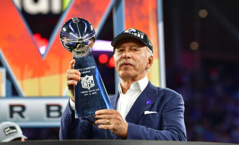 Los Angeles Rams' owner Stan Kroenke holds the Vince Lombardi trophy after the LA Rams won Super Bowl LVI against the Cincinnati Bengals at SoFi St...