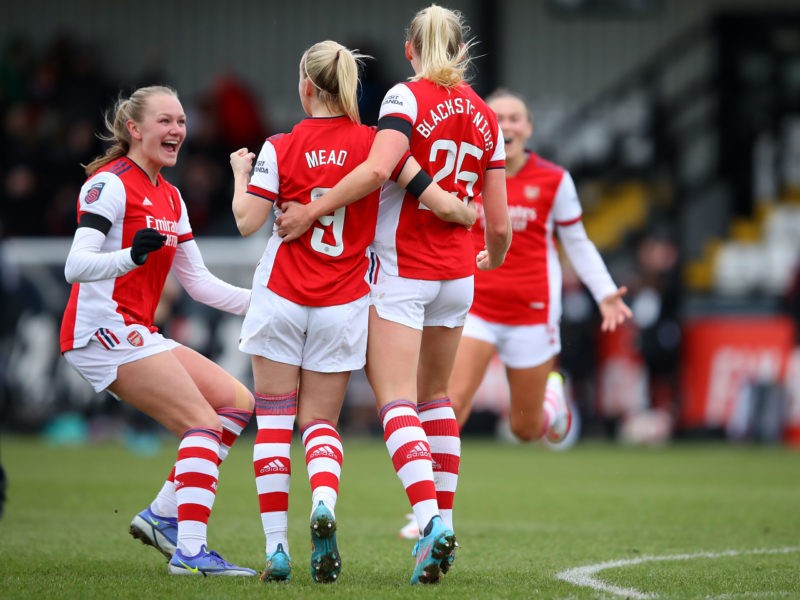 BOREHAMWOOD, ENGLAND - FEBRUARY 05: Stina Blackstenius of Arsenal celebrates with team mates after scoring her team's first goal of the game during...