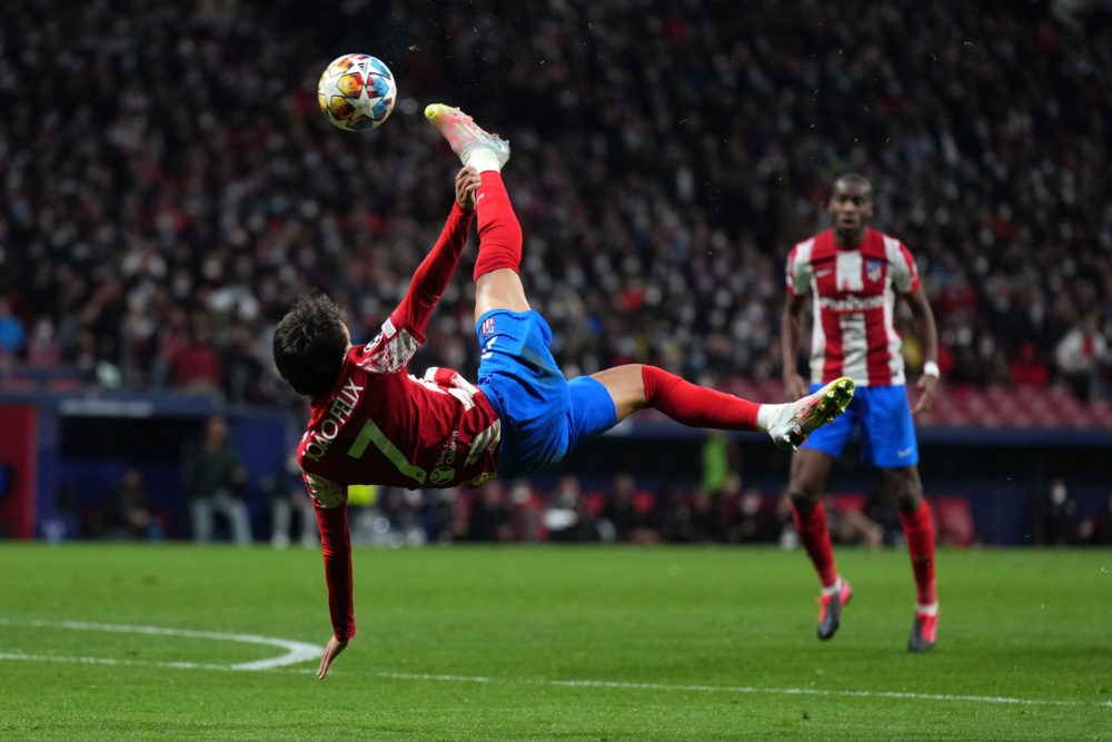 MADRID, SPAIN: Joao Felix of Atletico Madrid shoots with an overhead kick during the UEFA Champions League Round Of Sixteen Leg One match between A...
