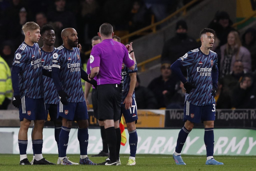 Multiple Wolves players complain over Arsenal celebrations 3 Arsenal's Brazilian striker Gabriel Martinelli (R) walks off having been shown two yellow cards in quick succession by English referee Michael Oliver during the English Premier League football match between Wolverhampton Wanderers and Arsenal at the Molineux stadium in Wolverhampton, central England on February 10, 2022. (Photo by ADRIAN DENNIS/AFP via Getty Images)