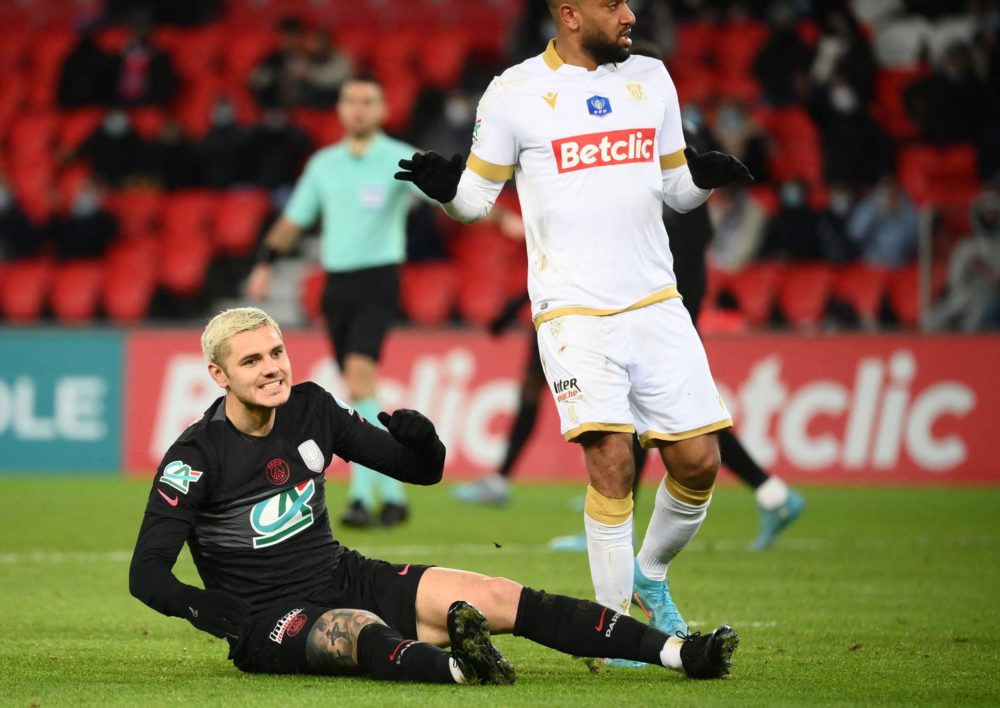 Paris Saint-Germain's Argentinian forward Mauro Icardi reacts after missing a goal opportunity during the French Cup football match between PSG and...