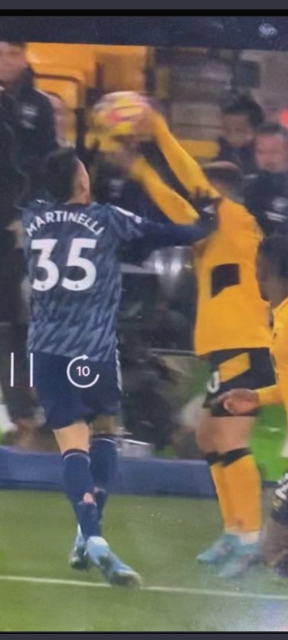 Foul throw caused by Martinelli's push means play should not have been allowed to restart