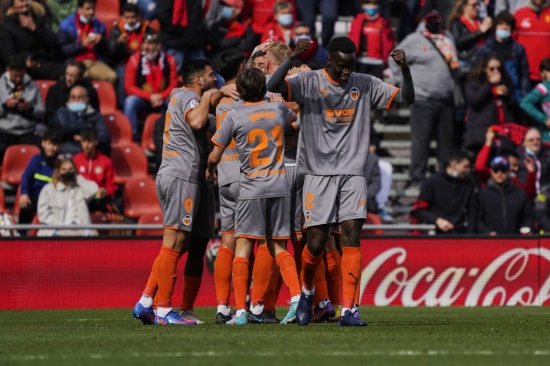 MALLORCA, SPAIN - FEBRUARY 26: Gabriel Paulista of Valencia CF celebrates scoring his team's first goal with teammates during the LaLiga Santander match between RCD Mallorca and Valencia CF at Estadio de Son Moix on February 26, 2022 in Mallorca, Spain. (Photo by Rafa Babot/Getty Images)