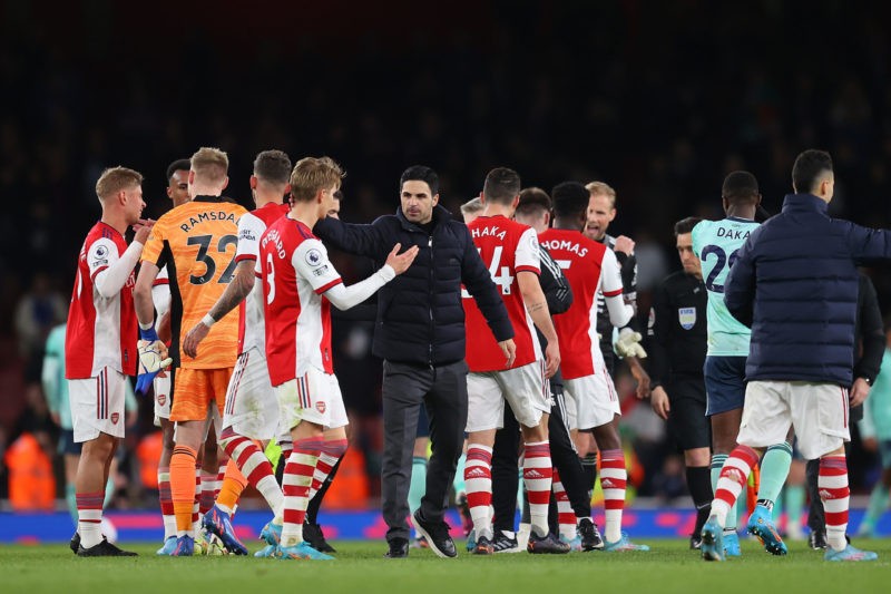 LONDON, ENGLAND - MARCH 13: Mikel Arteta, Manager of Arsenal embraces Martin Odegaard of Arsenal following victory in the Premier League match betw...