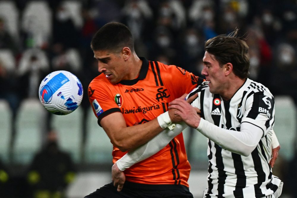 Juventus forward Dusan Vlahovic fights for the ball with Spezia midfielder Dimitris Nikolaou during the Italian Serie A football match between Juve...