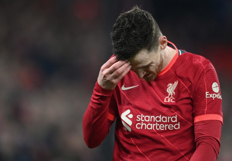 LIVERPOOL, ENGLAND - MARCH 08: Andy Robertson of Liverpool looks down during the UEFA Champions League Round Of Sixteen Leg Two match between Liver...