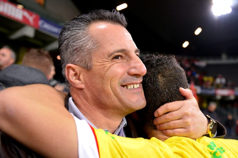 BERN, SWITZERLAND - OCTOBER 15: Granit Xhaka (R) of Switzerland is congratulated by his father Ragip Xhaka (L) after winning the FIFA 2014 World Cup Qualifier match between Switzerland and Slovenia match held at Stade de Suisse on October 15, 2013 in Bern, Switzerland. (Photo by Harold Cunningham/Getty Images)
