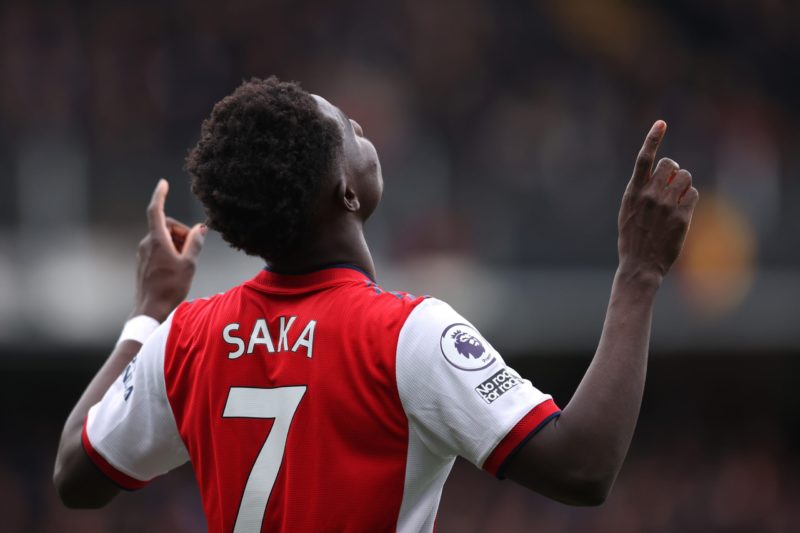 WATFORD, ENGLAND - MARCH 06: Bukayo Saka of Arsenal celebrates after scoring their sides second goal during the Premier League match between Watfor...