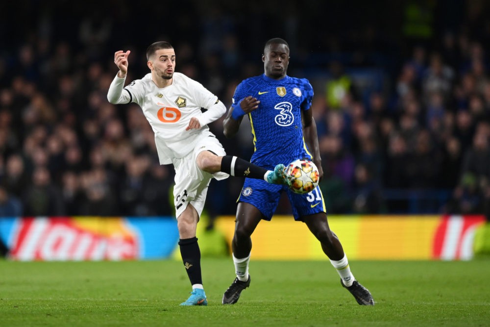 LONDON, ENGLAND: Malang Sarr of Chelsea battles for possession with Edon Zhegrova of Lille OSC during the UEFA Champions League Round Of Sixteen Le...