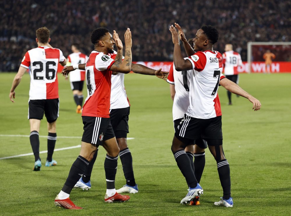 Feyenoord's Reiss Nelson (2nd L) and Luis Sinisterra (R) celebrate during the UEFA Conference League semi-final football match between Feyenoord an...