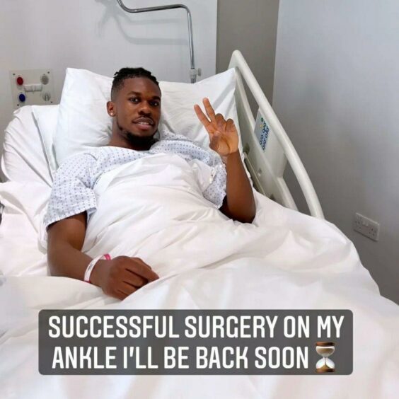 Tim Akinola after surgery