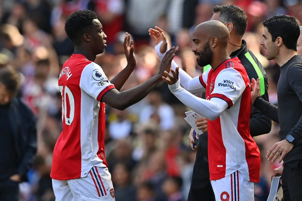 Arsenal's French striker Alexandre Lacazette (R) comes on for Arsenal's English striker Eddie Nketiah (L) during the English Premier League footbal...