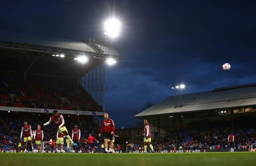 Arsenal's Ghanaian midfielder Thomas Partey (3L) warms up ahead of the English Premier League football match between Crystal Palace and Arsenal at ...