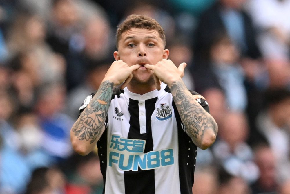 Newcastle United's English defender Kieran Trippier whistles to teammates during the English Premier League football match between Manchester City ...