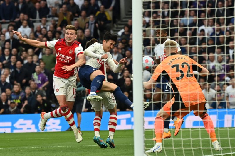 Tottenham Hotspur's South Korean striker Son Heung-Min (C) is fouled for a penalty during the English Premier League football match between Tottenham Hotspur and Arsenal at Tottenham Hotspur Stadium in London, on May 12, 2022. (Photo by GLYN KIRK/AFP via Getty Images)