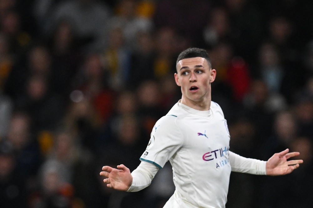Manchester City's English midfielder Phil Foden reacts during the English Premier League football match between Wolverhampton Wanderers and Manches...