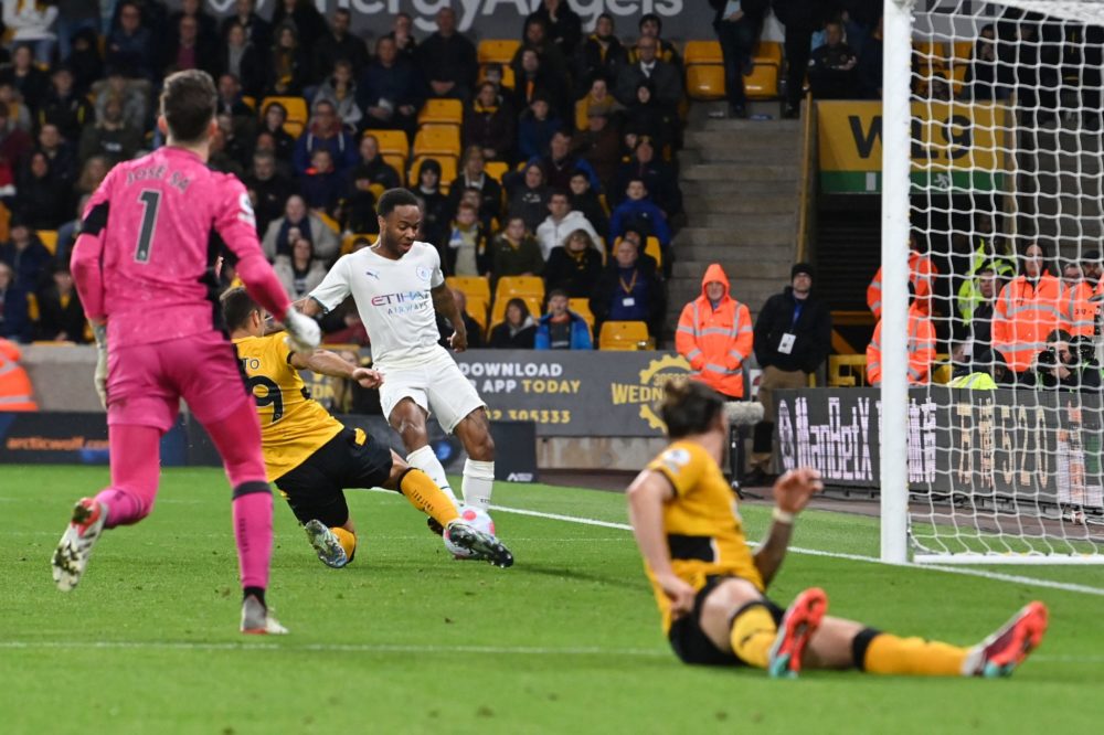 Manchester City's English midfielder Raheem Sterling scores his team's fifth goal during the English Premier League football match between Wolverha...