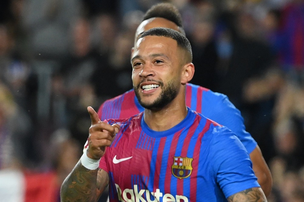 Barcelona's Dutch forward Memphis Depay celebrates after scoring a goal during the Spanish league football match between FC Barcelona and RC Celta ...