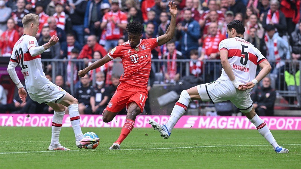 Bayern star sent off for hitting Arsenal loanee in the face 2 Bayern Munich's Kingsley Coman (C) attempts to score past Stuttgart's Chris Fuehrich (L) and Konstantinos Mavropanos during the German first division Bundesliga football match between FC Bayern Munich and VfB Stuttgart in Munich, southern Germany on May 8, 2022. (Photo by KERSTIN JOENSSON/AFP via Getty Images)