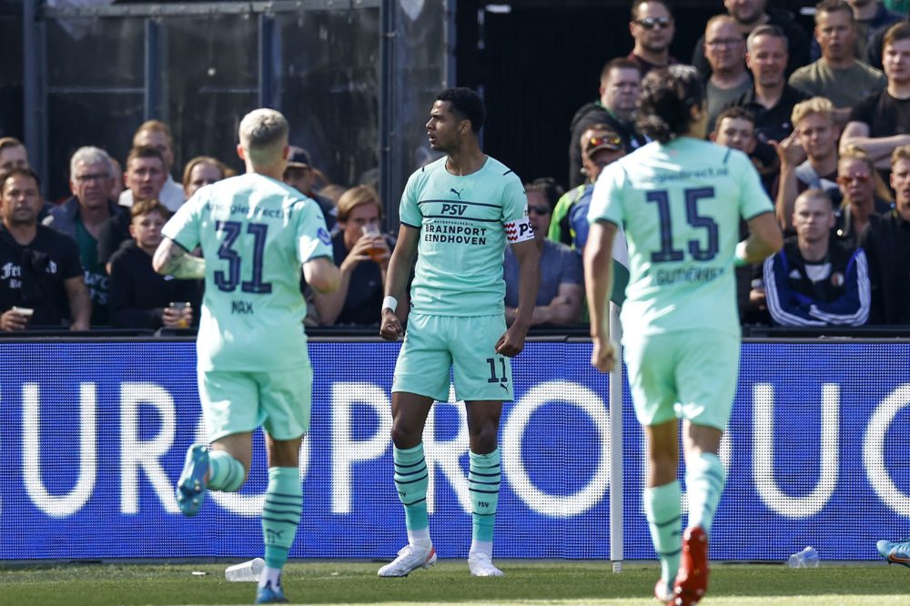 PSV Eindhoven's German defender Philipp Max, Dutch forward Cody Gakpo and Mexican midfielder Erick Gutierrez celebrate their team's first goal duri...
