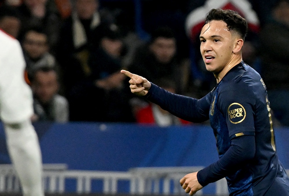 Porto's Brazilian striker Pepe celebrates scoring his team's first goal during the UEFA Europa League round of 16 second leg football match between Olympique Lyonnais and FC Porto at the Groupama Stadium in Decines-Charpieu, near Lyon, on March 17, 2022. (Photo by JEAN-PHILIPPE KSIAZEK/AFP via Getty Images)