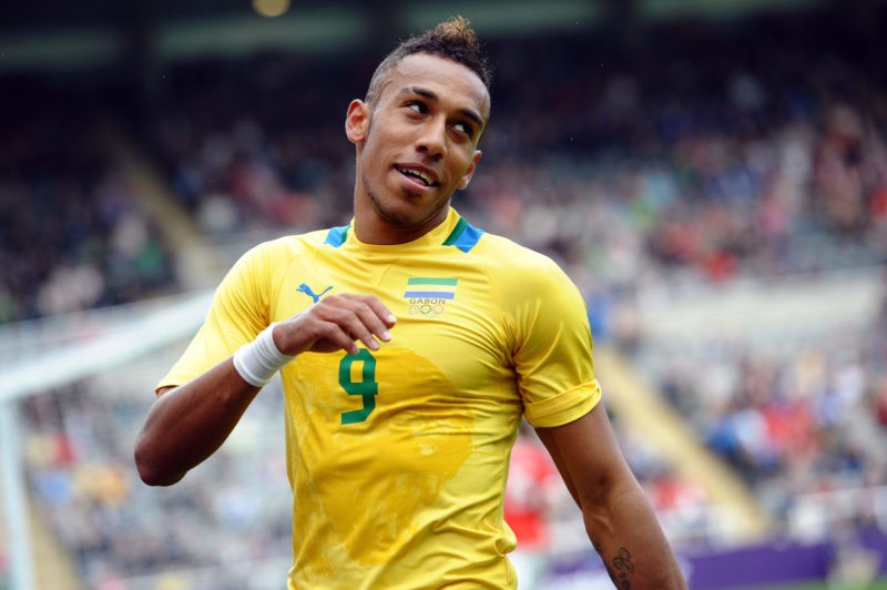 Gabon's Pierre Aubameyang (R) celebrates after scoring during the 2012 Olympic mens football match between Gabon and Switzerland at St James' Park ...