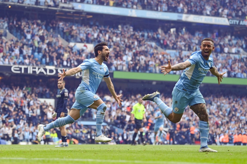 MANCHESTER, ENGLAND: Ilkay Guendogan of Manchester City celebrates after scoring their team's third goal with Gabriel Jesus during the Premier Leag...