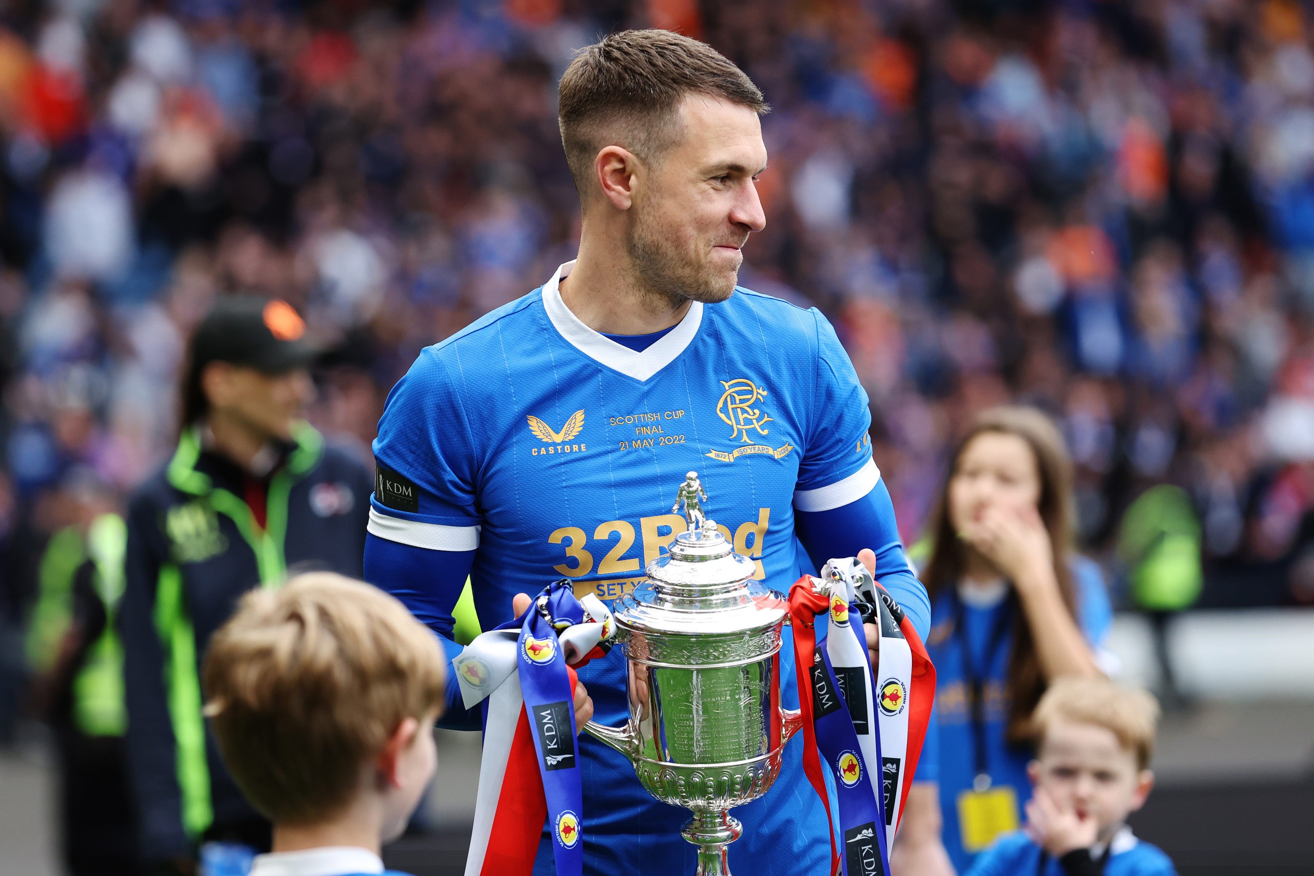 GLASGOW, SCOTLAND: Aaron Ramsey of Rangers celebrates with the Scottish Cup trophy following victory in the Scottish Cup Final match between Ranger...
