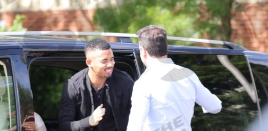 Gabriel Jesus arriving for a medical and greeting Edu Gaspar (via The Sun)