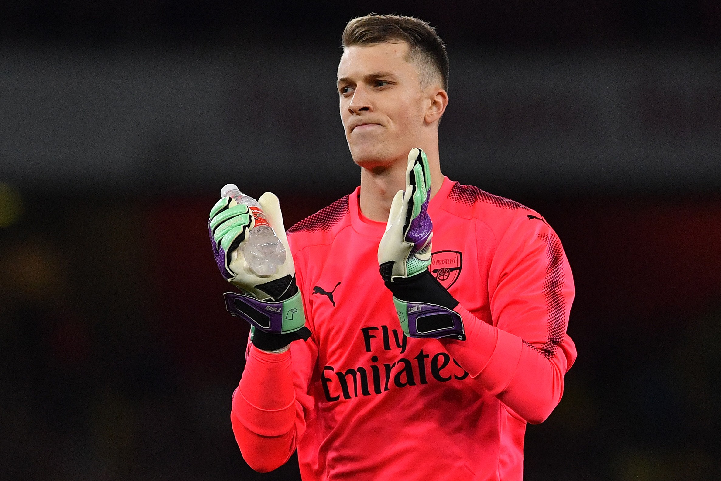 Arsenal's English goalkeeper Matt Macey warms up ahead of the English League Cup fourth round football match between Arsenal and Norwich City at Th...