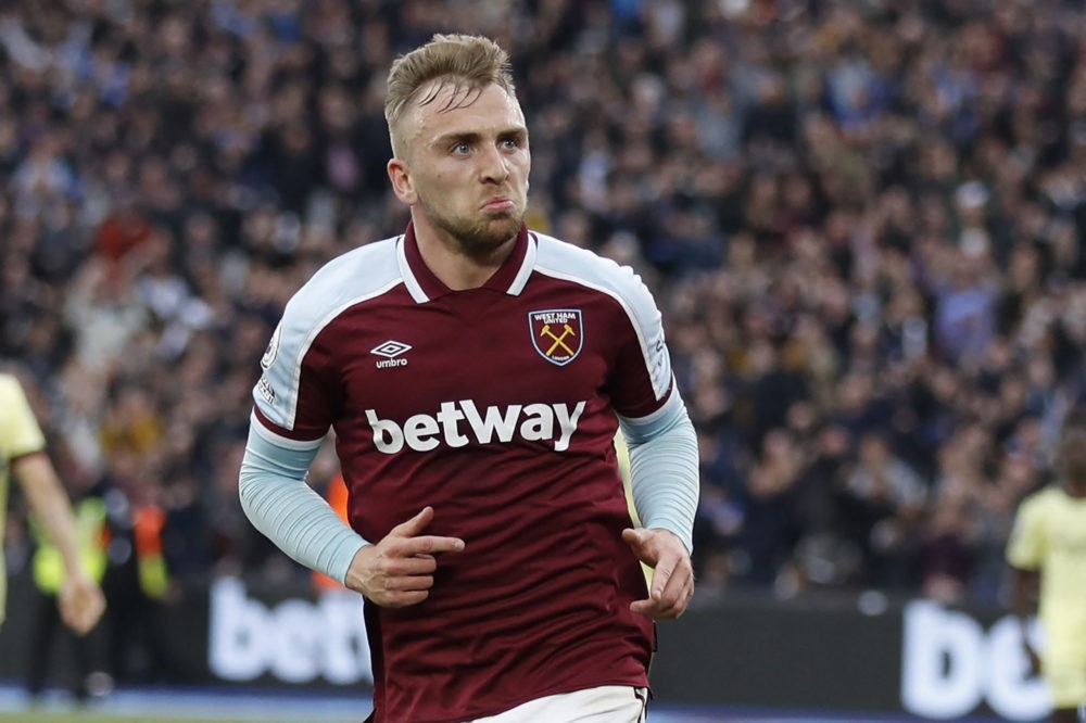 West Ham United's English striker Jarrod Bowen celebrates after scoring their first goal during the English Premier League football match between W...